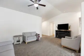 Living Room looking toward the hallway where there are 2 bedrooms and the guest bath as well as the laundry room leading out to the garage.