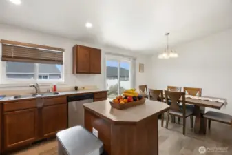 The sliding glass door leads out to the back yard.