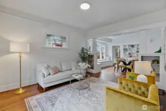 Light filled living room flows into dining room