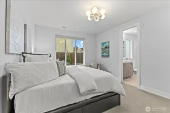 Privately situated on the main floor, this guest suite offers a beautifully appointed retreat for visitors or multigenerational living, blending comfort with quiet sophistication.