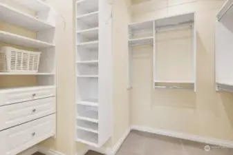 The walk-in closet offers ample space for organized and efficient wardrobe storage.