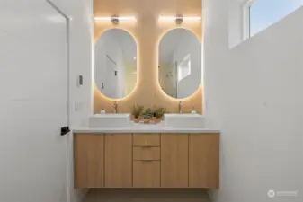 Primary Bath Vanity with powered defogging mirrors