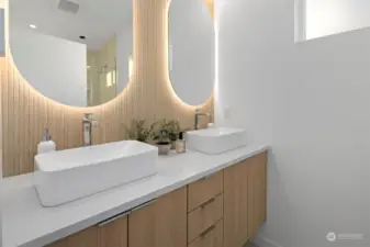 Primary Bath vanity with powered defogging mirrors