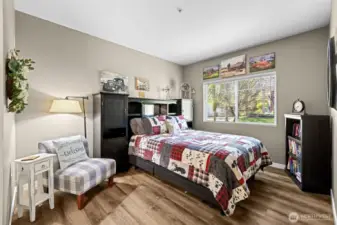 Tucked away for privacy, the primary suite offers peaceful views, great natural light, and plenty of room to unwind and recharge.