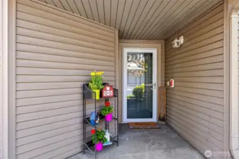 A covered front porch keeps your deliveries dry and protected—while adding charm and providing a cozy spot to greet guests or unwind for a moment.