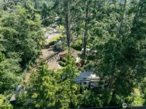 Aerial view shows the fencing and privacy of this property.