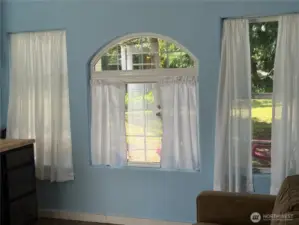 Decorative windows and lots of room for a full-sized sofa.