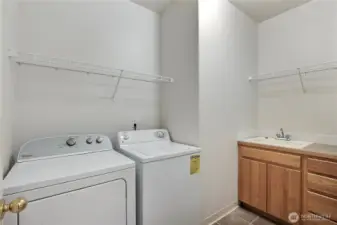 Laundry room with sink.