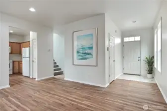 Back door leads to the fenced yard.  Coat closet for additional storage.