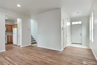 Beautiful modern vinyl plank flooring throughout most of downstairs.