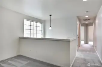 Hallway leads to second two bedrooms and hall bath.  New carpet throughout.