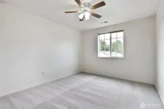 Bedroom 2 with ceiling fan.