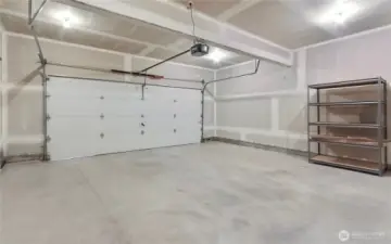Garage has additional storage on both sides. New water heater just installed.