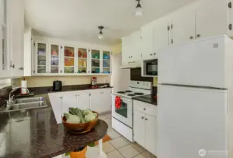 Sweet Vintage Kitchen with Glass Displays