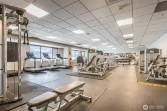 Fitness Center - West Tower, 2nd Floor - Includes: Fitness equipment, Locker room with showers and changing rooms, and complimentary towel service. Upkeep managed by Pan Pacific Hotel Management.
