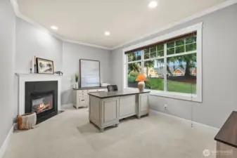 Work from home in style with a fireplace office retreat.