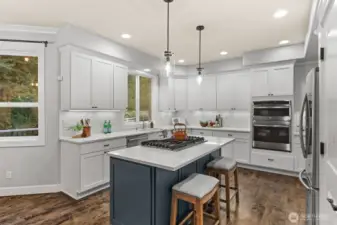 Large island makes this kitchen the heart of the home.