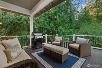 Relax on the deck with views of fall foliage and apple trees.