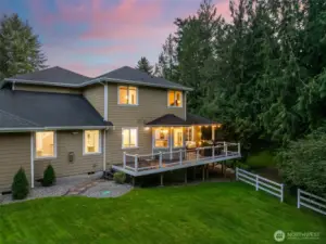 Massive backyard, perfect for entertaining, with a new fence.