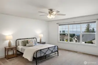 Stunning view from the primary bedroom, bathroom & main level!