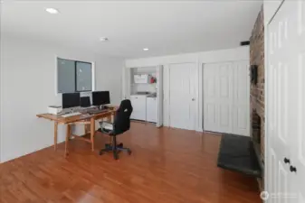 Family room, laundry area, see through fireplace to the right.