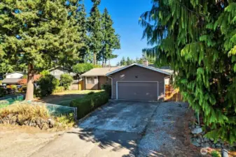 2 car attached garage with parking to the right. RV-Boat-Trailer. NO HOA!
