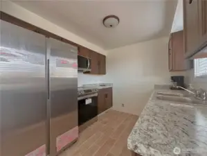 Kitchen with new cabinets and counters.