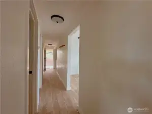 Hallway view towards covered carport.