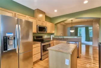 Main floor - open concept - kitchen with stainless steel appliances.