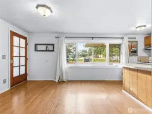 Inside the entrance to the condo. With open concept living and great natural light.