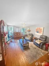 Large Living Room with Deck and Large Windows