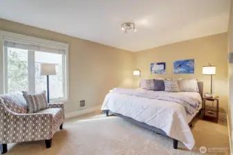 The spacious primary bedroom.