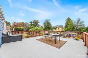 Spacious deck with access from the living room or primary bedroom~ Amazing spot to entertain or watch the sunsets!