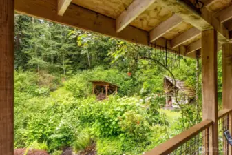 You can spot the cob oven and firewood stash.