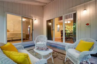 Easy flow from the dinning area to this expansive covered patio is great for rain or shine for entertaining.  Or from the primary bedroom for an outdoor moment to let the stress from the day slip away.