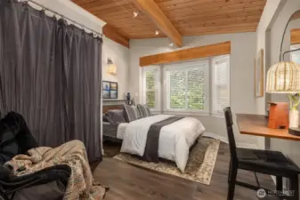 2nd of three bedrooms. Plenty of storage and even includes a built in desk!