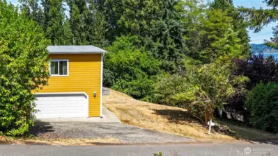 On Inverness Court, facing north towards the house, the water is to your right.