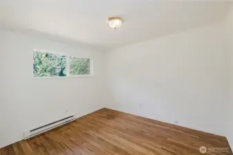 One of the three bedrooms, again the real hardwood floors were completely restored to their original glory.