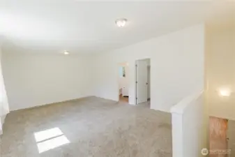 This big upstairs room could be the primary bedroom if you do not want it on the main floor.