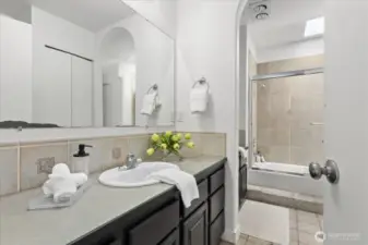 Updated bath with modern finishes and fresh design.