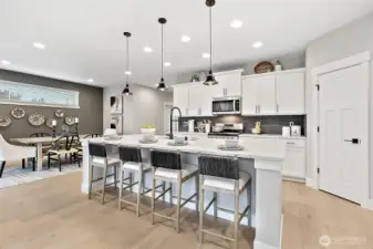 Photos of a 2703 Model Home at another community. Details will vary