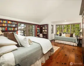 Large second primary bedroom with room for a daybed, seating area, or desk.