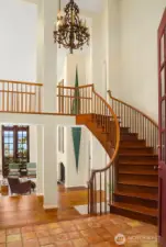 Grand staircase to second level with open walkway for visual access to the breathtaking view.