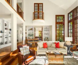 Built in bookshelves provide plentiful space for display of art, books, and photos.