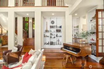 Spacious living area with room for multiple seating areas or a baby grand piano.