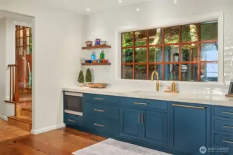 All new custom cabinetry with solid bronze hardware and Sharp built in microwave convection oven.