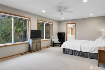 Spacious primary suite with 5-piece en-suite bathroom and walk in closet