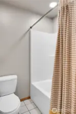 Full hall bathroom with tub