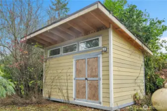 Insulated shed on side of the property!