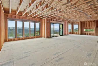 Dining room with LOTS of windows to enjoy the view with every meal.